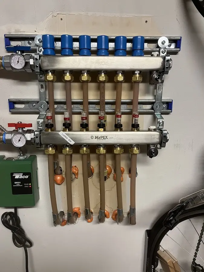 Plumber performing Leak Detection at a residential property in Rehoboth